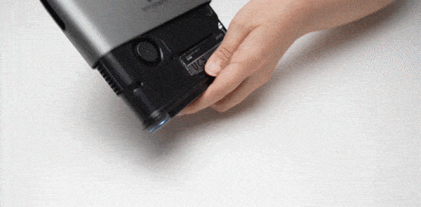 Replace the cover and tighten the screws.