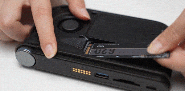 Insert the M.2 NVMe SSD into the slot and tighten the screw.