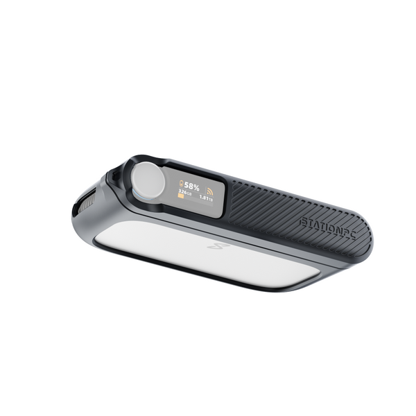 A black silicone protective cover for a PocketCloud portable NAS, displaying a digital LED screen on the front.